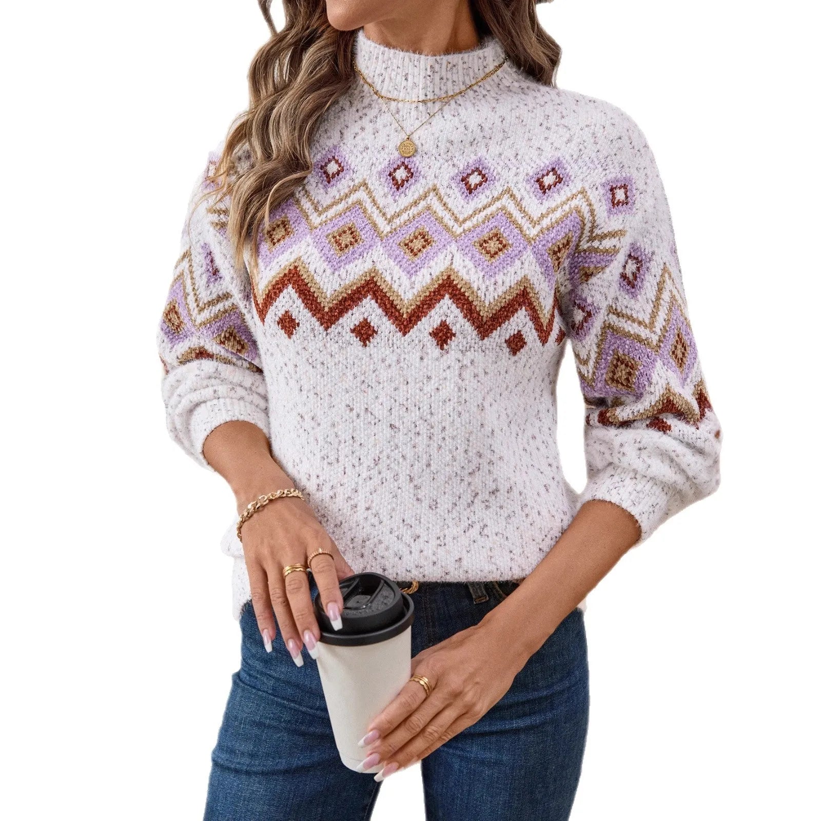 White geometric pattern half turtleneck loose fit long sleeve sweater on a hanger.
