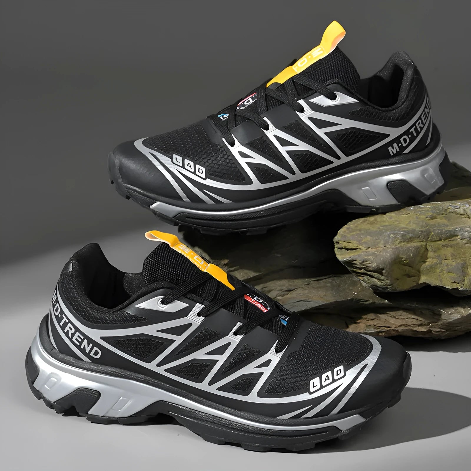 Low top hiking shoes in khaki with round toe, artificial leather upper, and flat rubber sole.