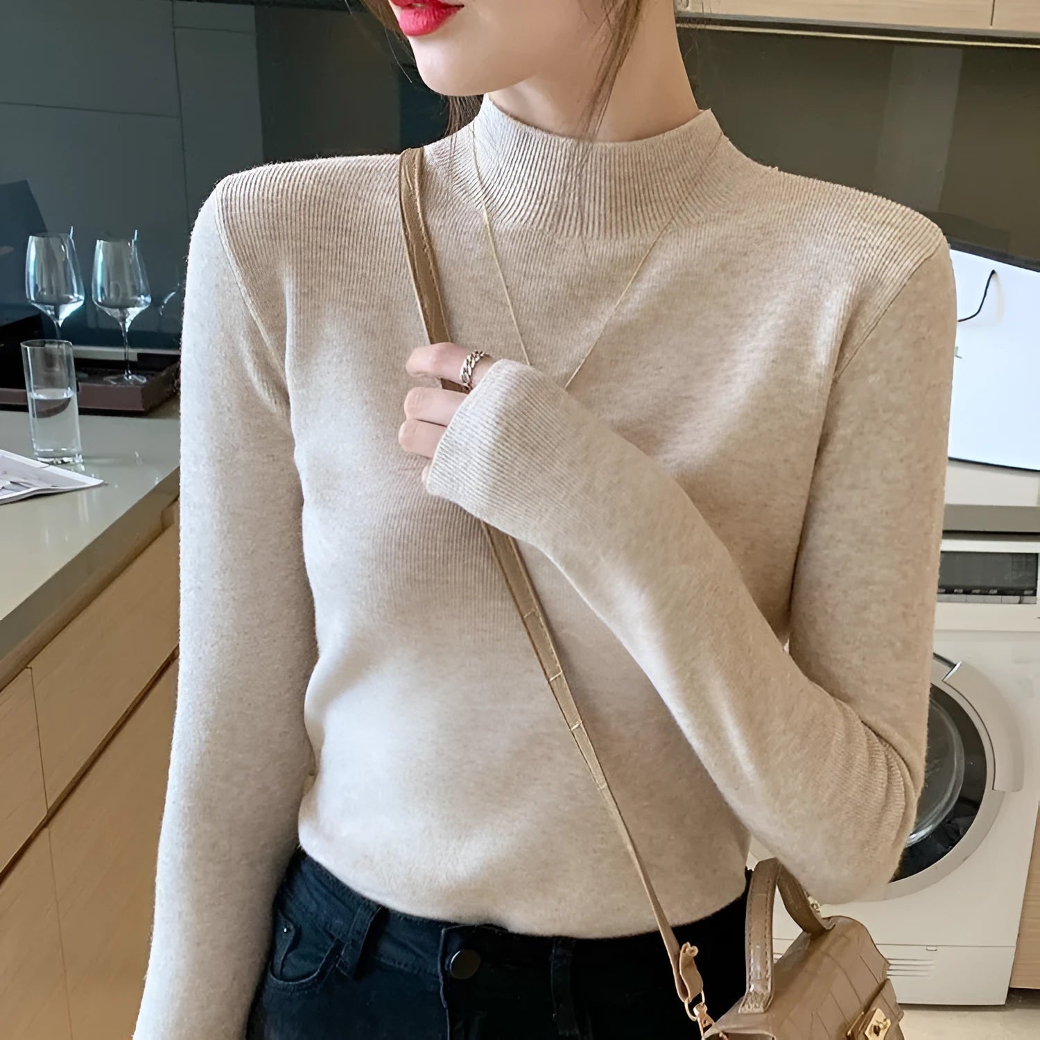 Women's slim fit knitted top in viscose fibre with long sleeves available in eight colours