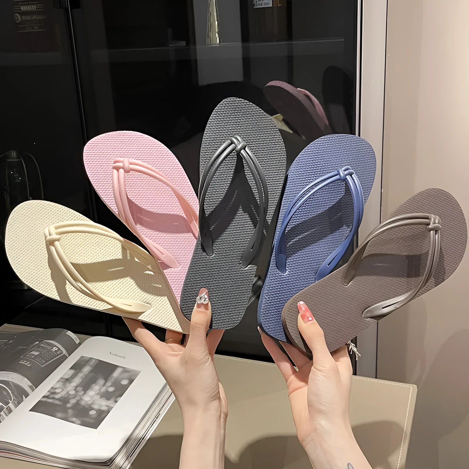 Men's PVC toe-covering flip flops on a solid colour background, showing the non-slip sole and range of available colours.