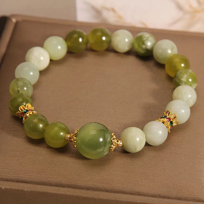 Women's jade bracelet in Xiuyan jade green colour with original design