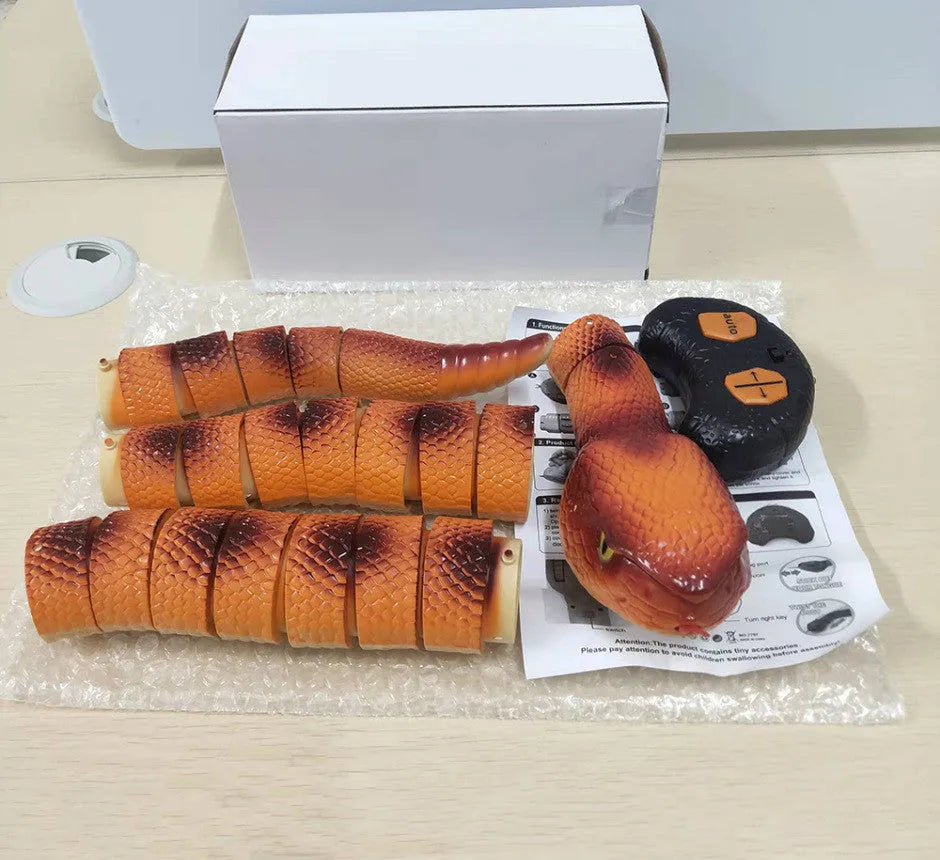 Automatic smart sensing snake cat toy with segmented body for realistic slithering movement