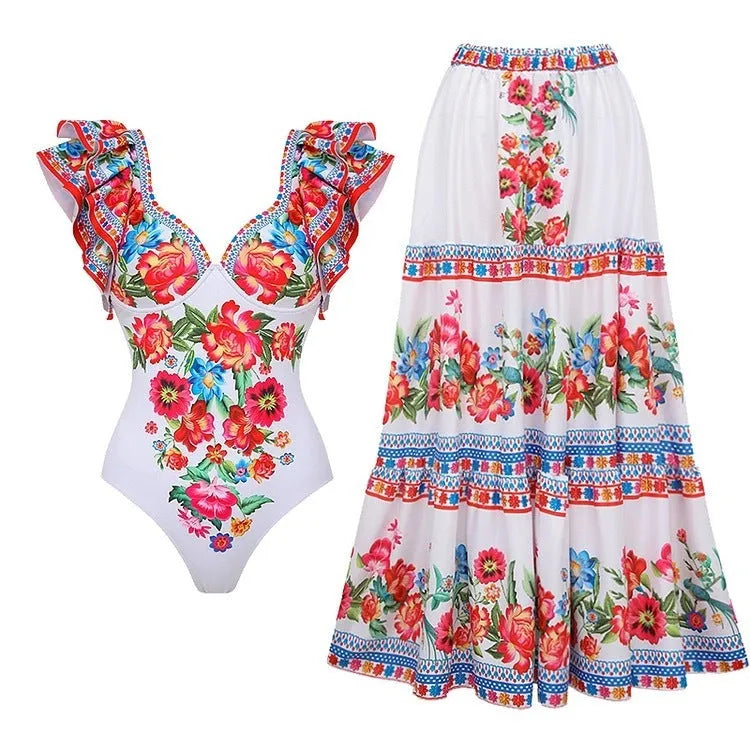 Women's floral print one-piece swimsuit with optional skirt in rose pink, white, blue, or red.