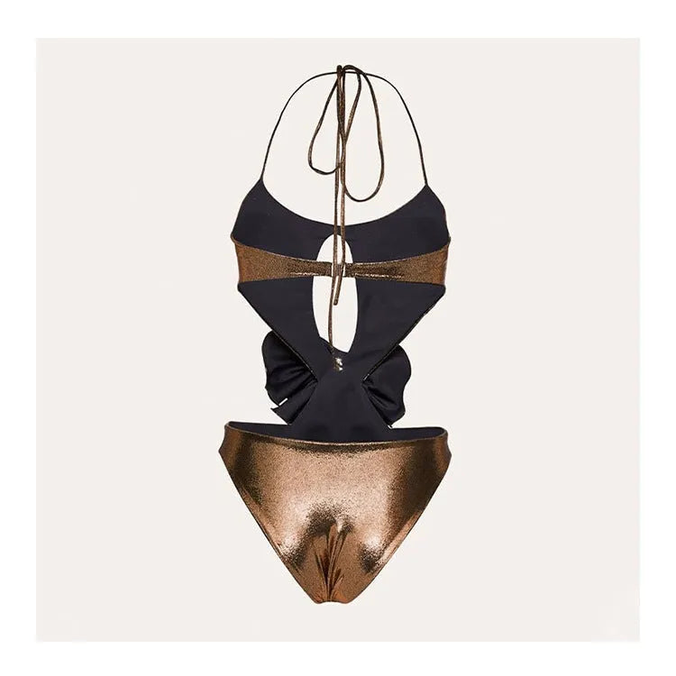 Gold coloured one-piece swimsuit with a halter neck and hollow-out design on a mannequin.