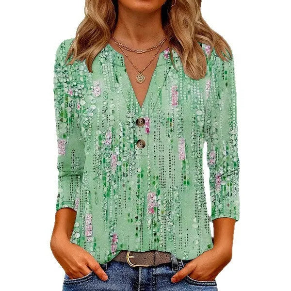 Women's loose V-neck casual top with a 3D printed pattern, shown in a solid colour.