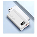 Black and white large capacity power bank with plastic shell showing fast charge support.