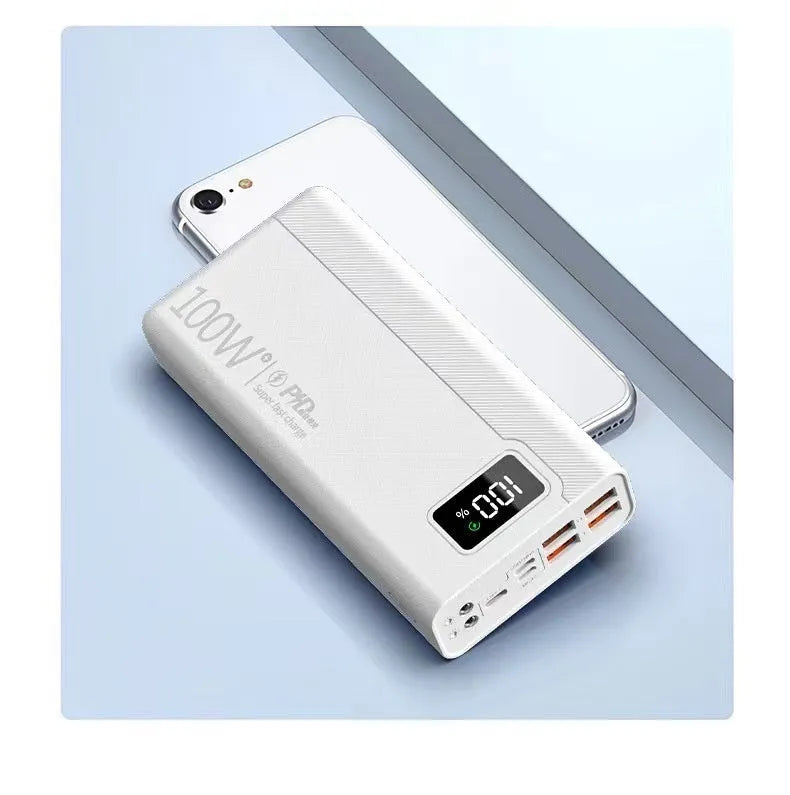Black and white large capacity power bank with plastic shell showing fast charge support.