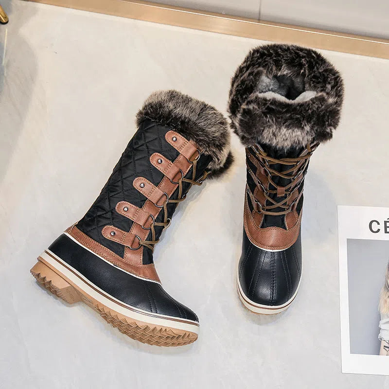 Women's high-top flat snow boots in black synthetic leather with round toe and high-top shaft