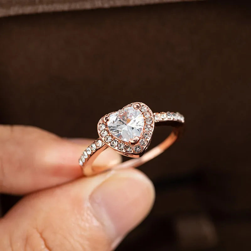 Heart-shaped women's wedding ring with crystal setting in rose gold or silvery electroplated finish