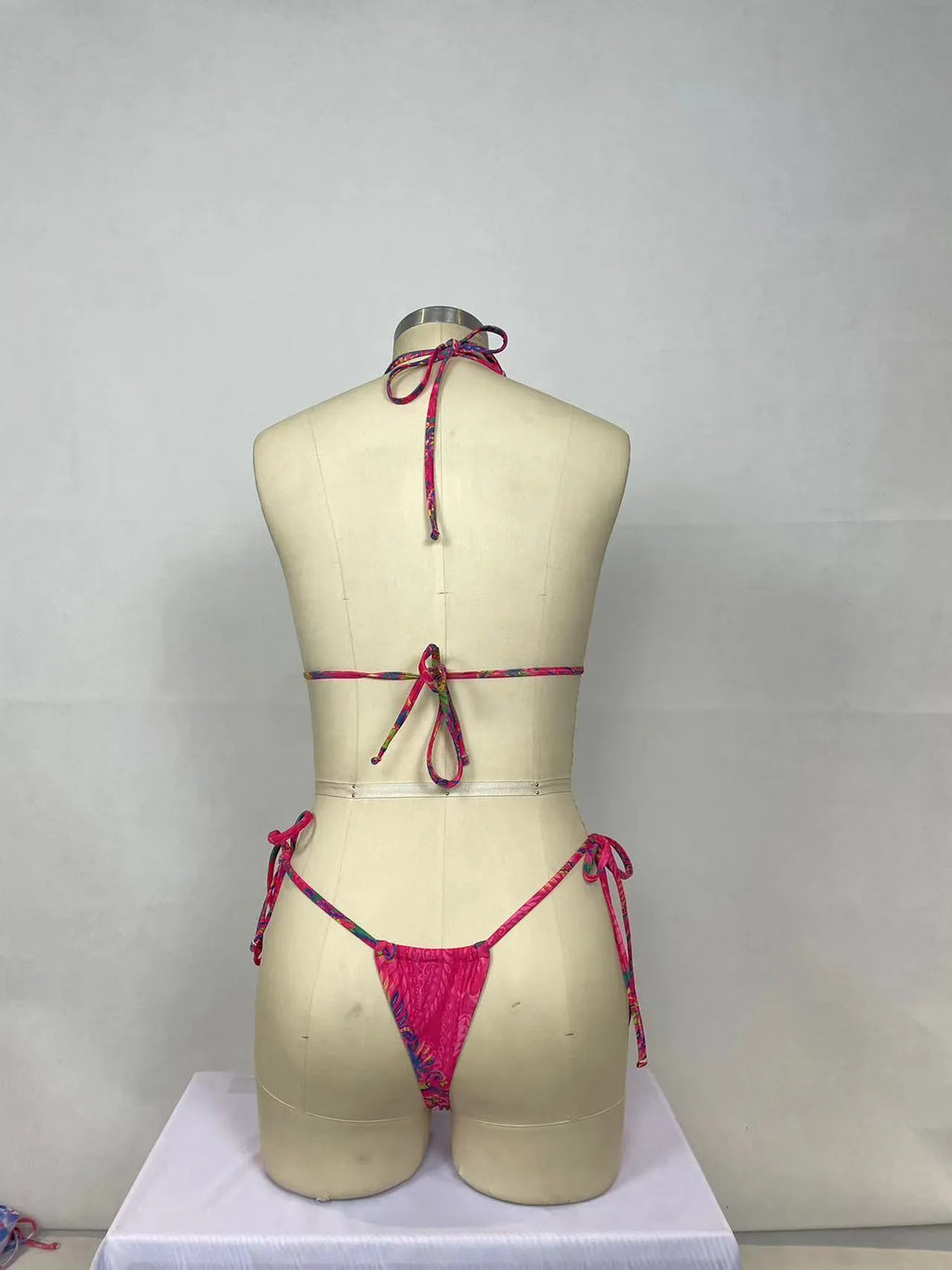 Pink printed two-piece bikini set in nylon with 22% lining, sizes S to XL