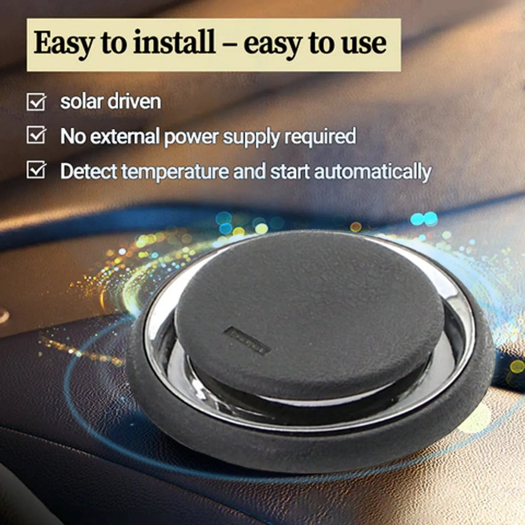 Compact black portable car deicing instrument for melting windscreen ice and snow.