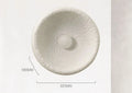Japanese-style simple silent wall lamp with white resin shade in a modern room setting.