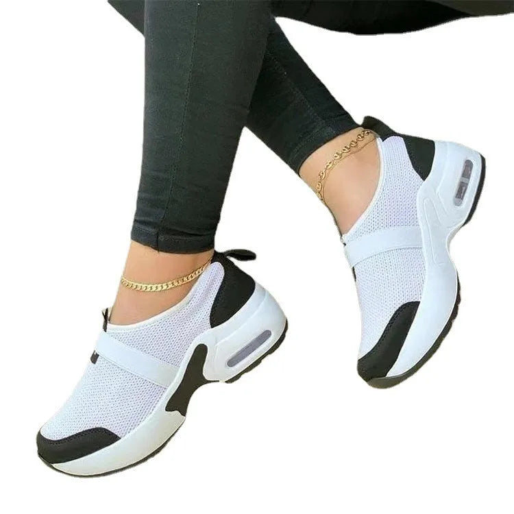 Women's lightweight white mesh sneakers with round toe and non-slip rubber sole