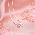 Silver cherry necklace for women with adjustable snake bone chain and fruit-shaped pendant.