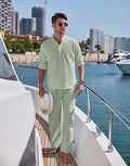 Men's solid colour cotton casual suit with long sleeves and trousers on a hanger