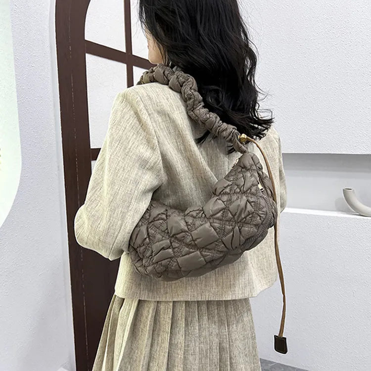Women's simple nylon cloud underarm messenger bag in a solid colour with an adjustable shoulder strap.
