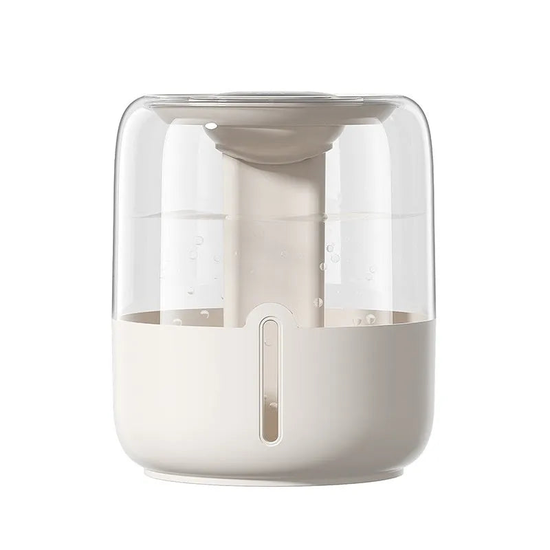 Beige round USB humidifier with dual spray outlets, humidity display, and night light on a table.