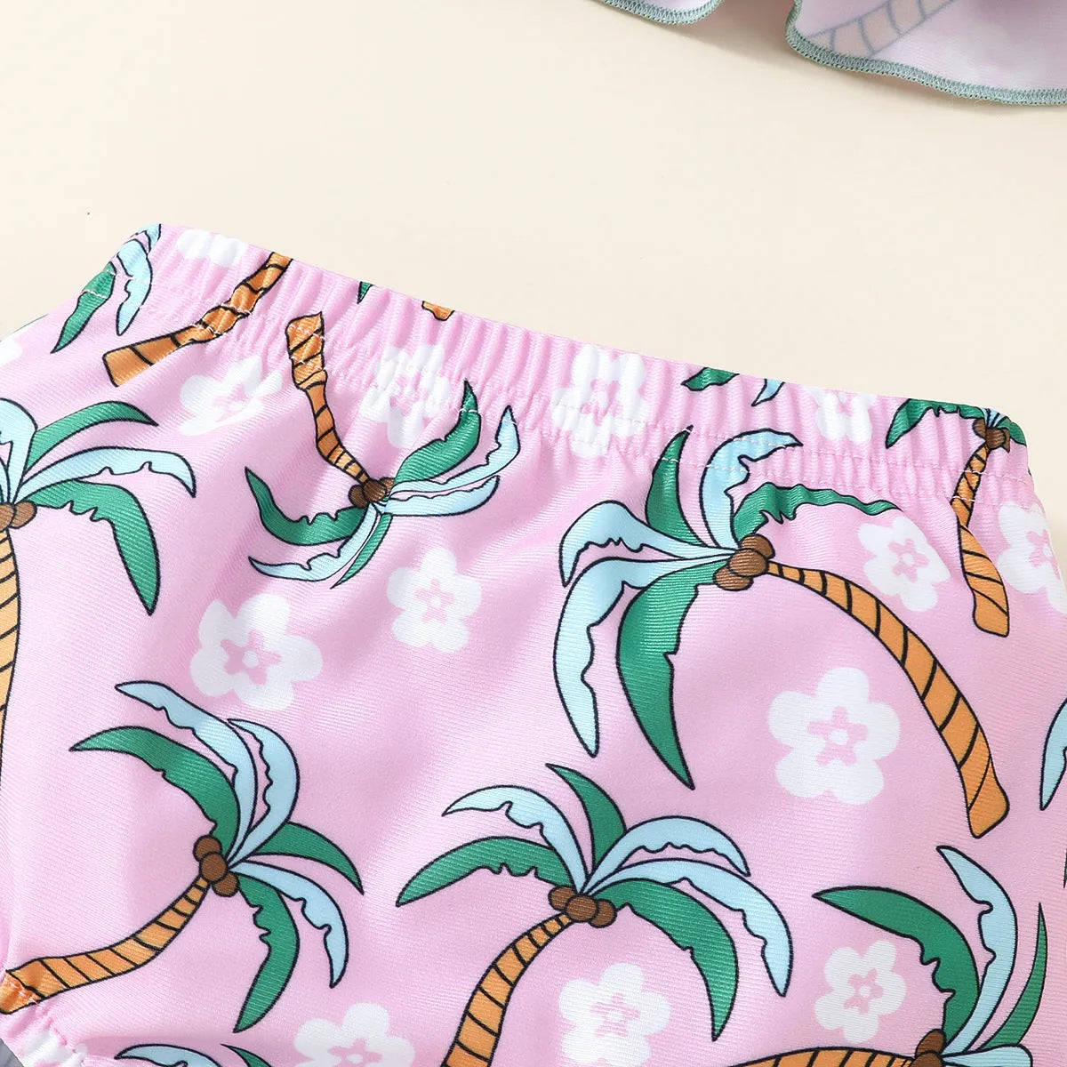 Girls white polyester two-piece swimsuit set with top and shorts for beach or pool