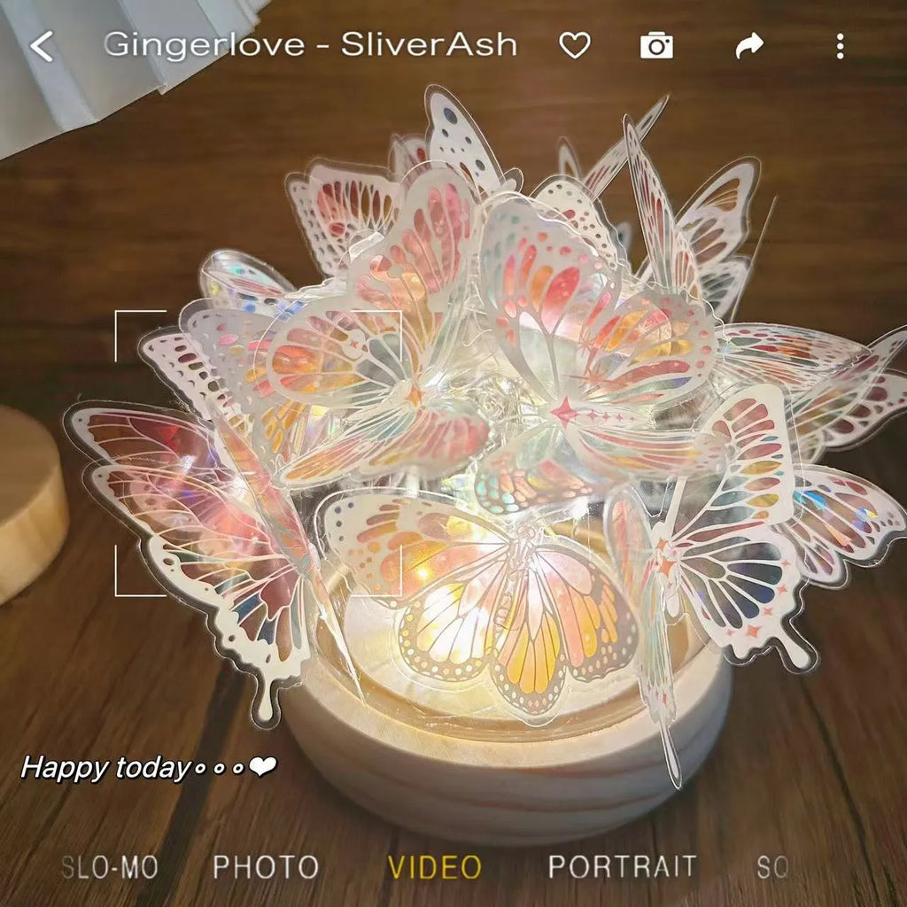 Butterfly shaped night lamp with glass shade on raw wood base measuring 12x15cm