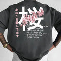 Men's short-sleeved loose fit cotton T-shirt in black pullover style on model