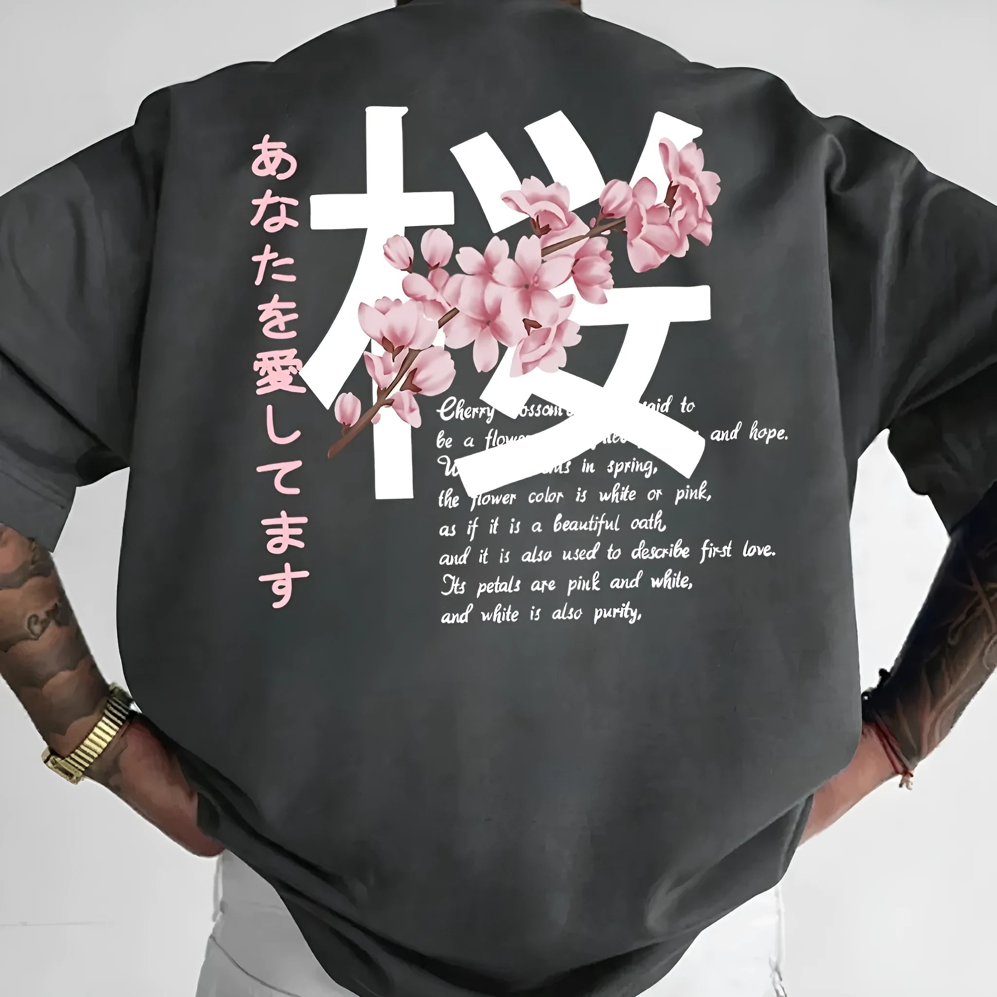 Men's short-sleeved loose fit cotton T-shirt in black pullover style on model