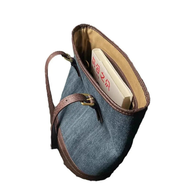 Denim patchwork one-shoulder bucket handbag showing 23x27x16cm dimensions and polyester construction