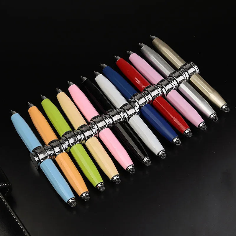 Metal ballpoint pen with a spinning gyro on top, shown in 10.5cm length, with selectable ink colour options.