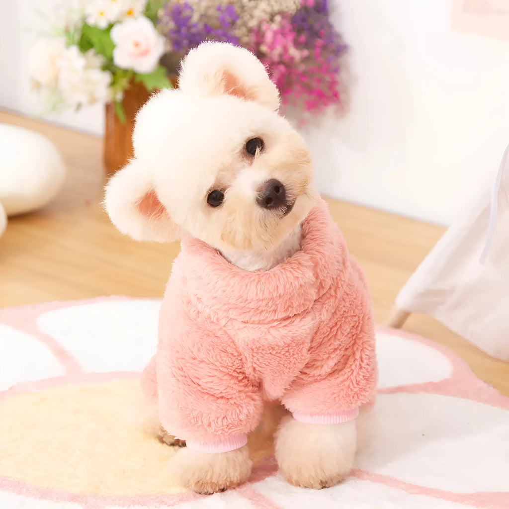 Khaki four-legged dog jumper with high collar and a towing ring on the back, made of thick plush fabric.