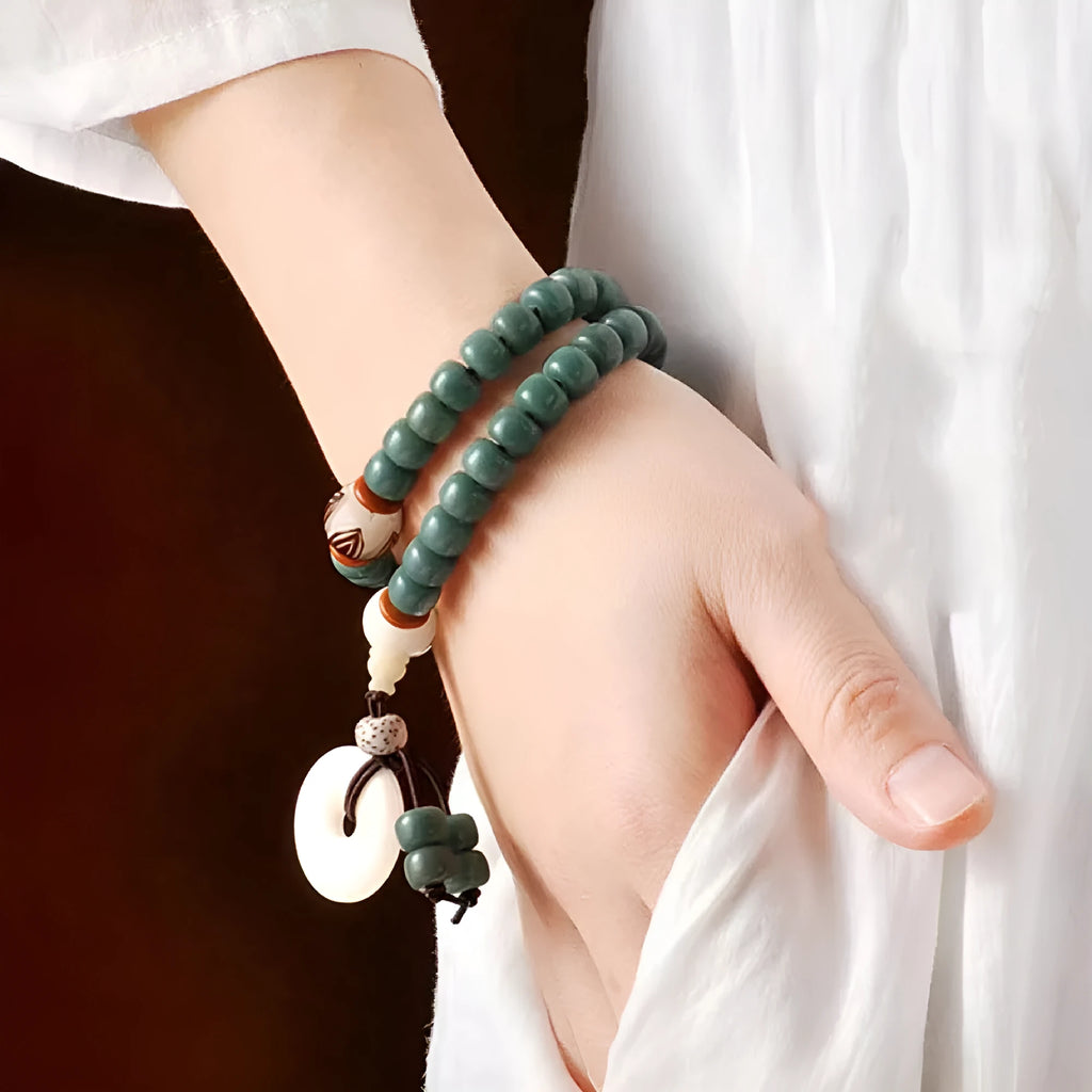 White jade bodhi seed bracelet with green sandalwood beads and double ring safety buckle