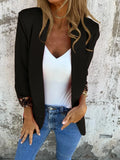 Slim fit black cheetah pattern lapel jacket with regular sleeves on mannequin