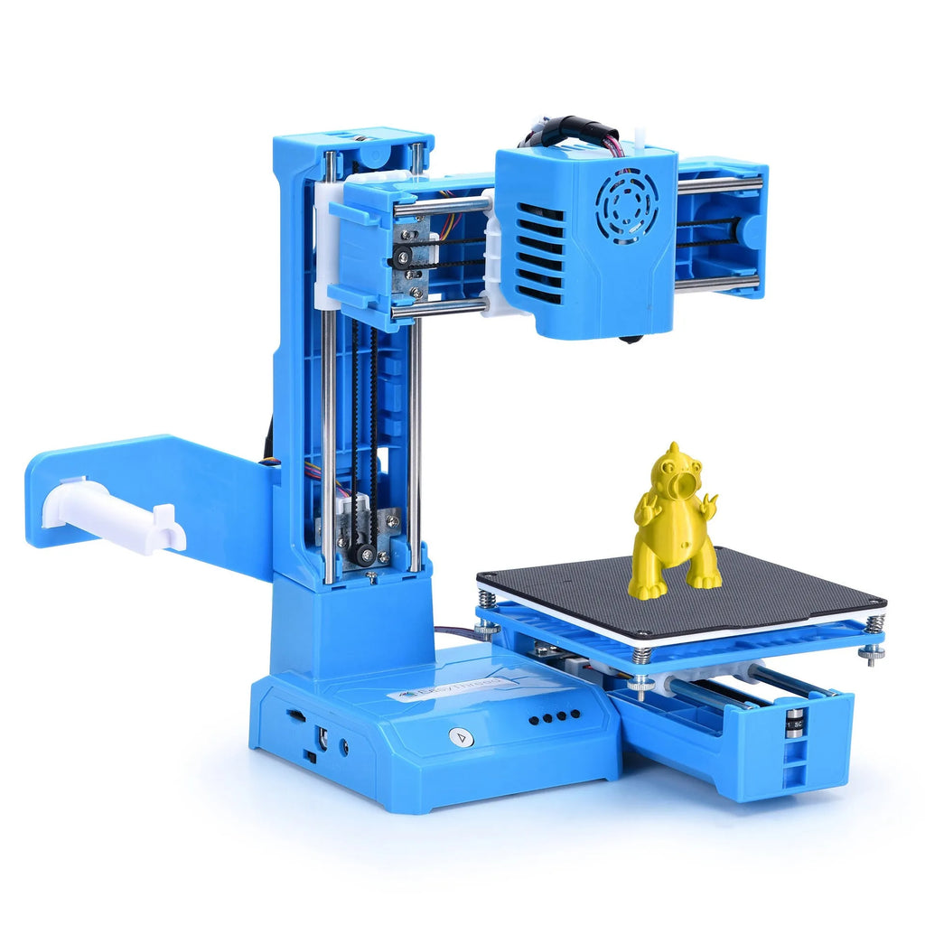 Black and blue K9 Mini desktop 3D printer on a table next to a small printed model.