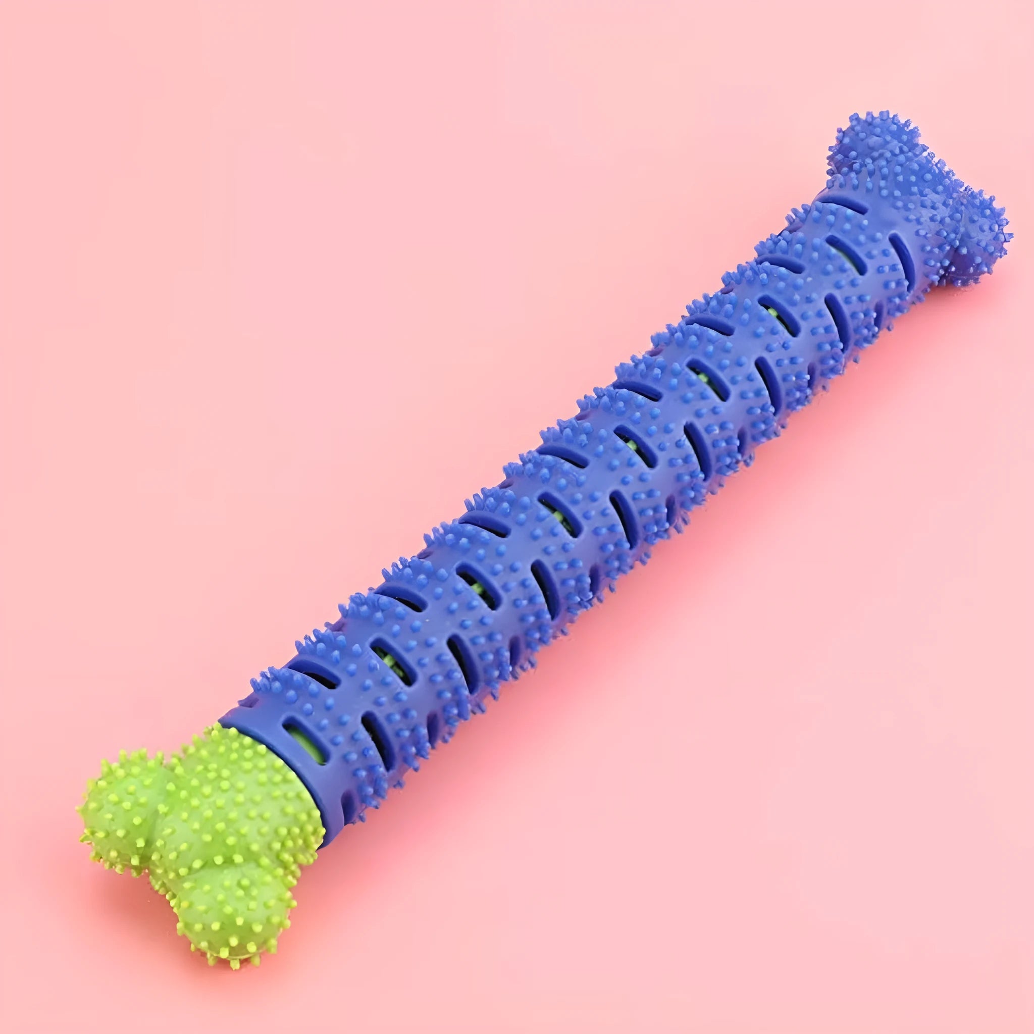 Blue-green silicone dog dental chew toy with serrated brush head and gum massage nodules