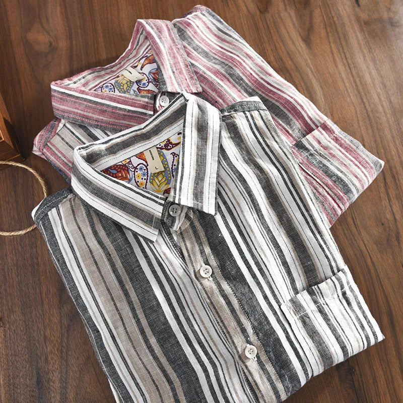 Men's gray striped linen shirt with long sleeves and loose fit on a hanger