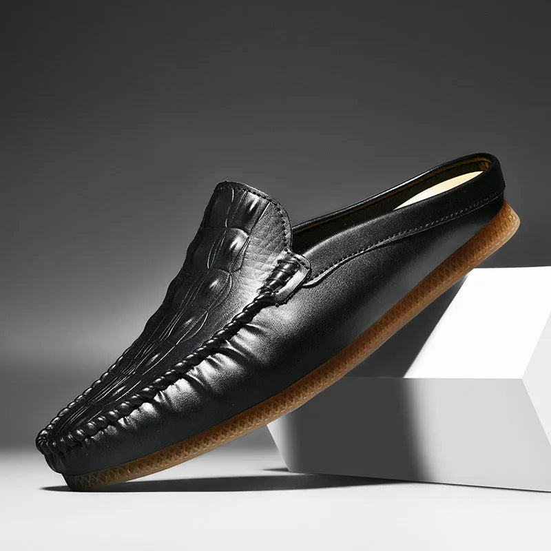 Men's black breathable Gommino semi-slippers with artificial PU upper and rubber sole on a white background