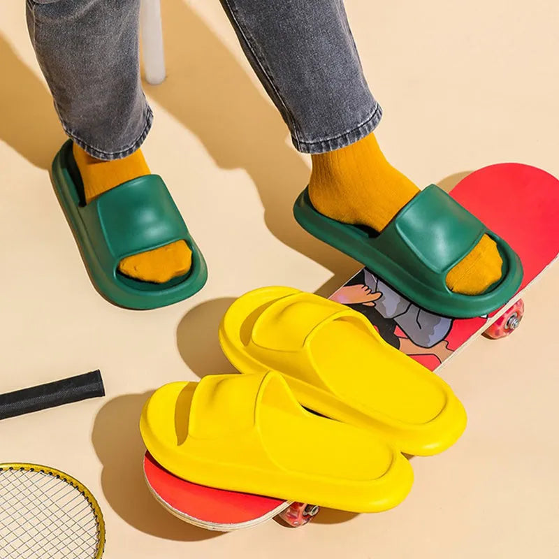 Unisex thick-soled EVA flip-flop slippers in multiple colours on a white background.