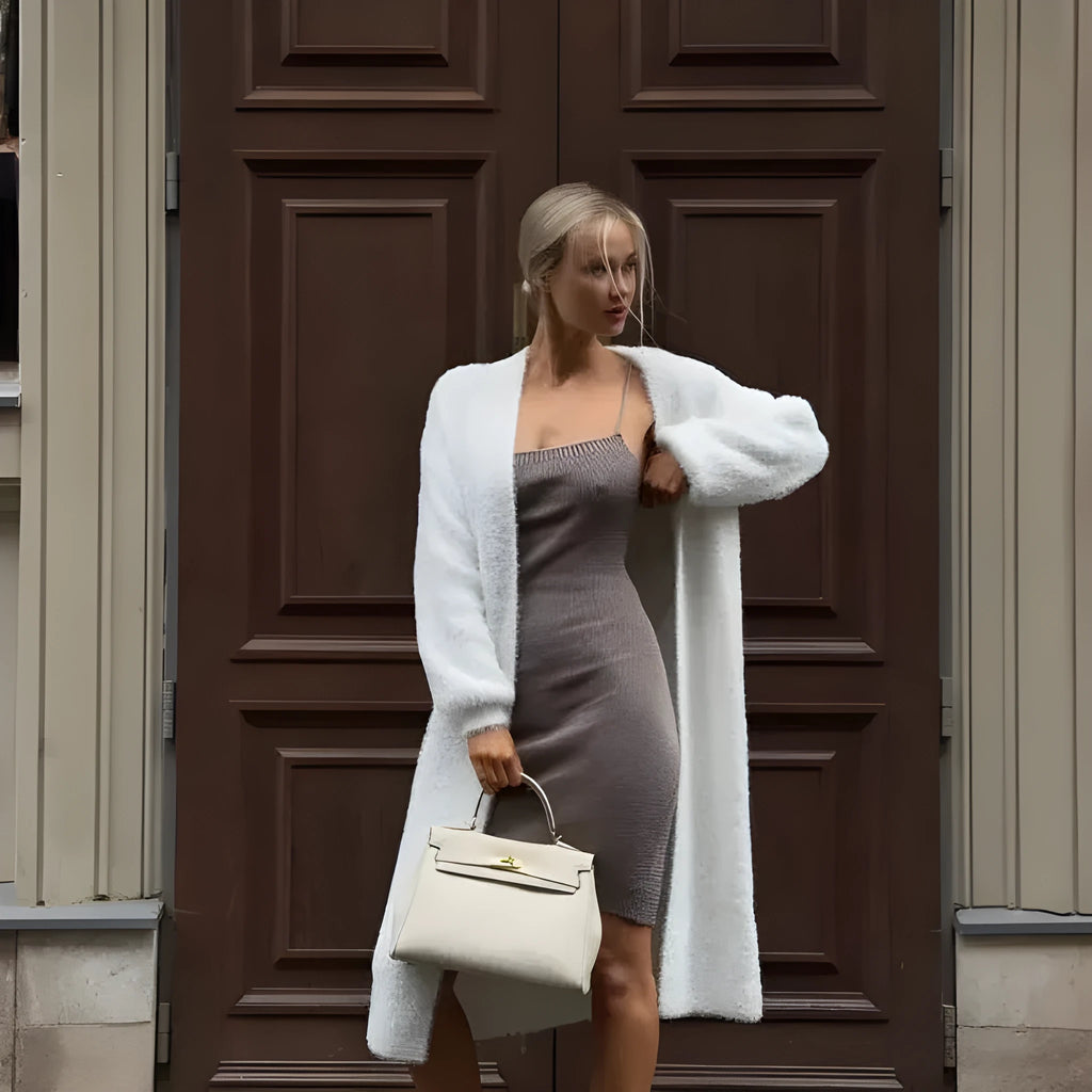 White long knitted cardigan jacket on a model, showing loose fit and 105cm length.