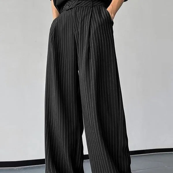 Black men's trousers with vertical stripes and pleated design featuring elastic waistband