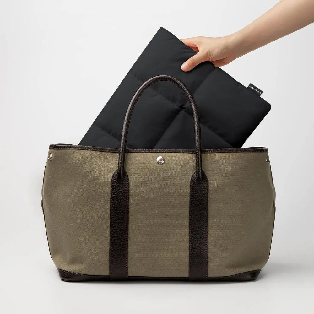 Soft fluffy polyester laptop sleeve in black or khaki with retro sewing details for 13 to 15.6 inch laptops
