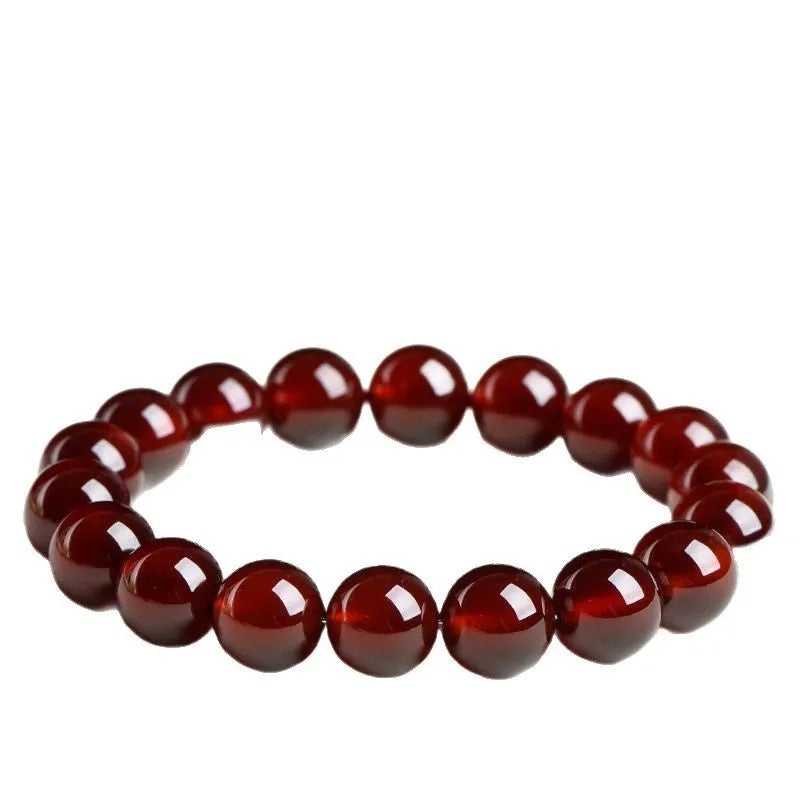 Crystal bracelet with natural orange red garnet beads and traditional Chinese ruyi charm in retro unisex design