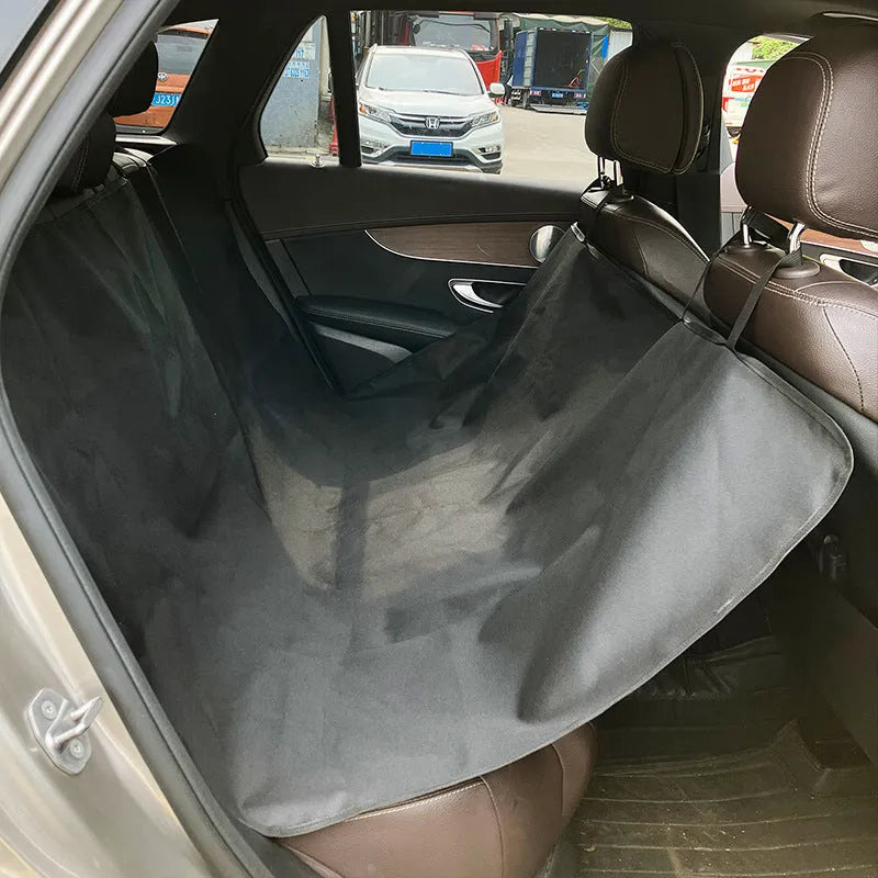 Water resistant cloth car pet mat for the rear seat, shown in a grey dog footprint print design.