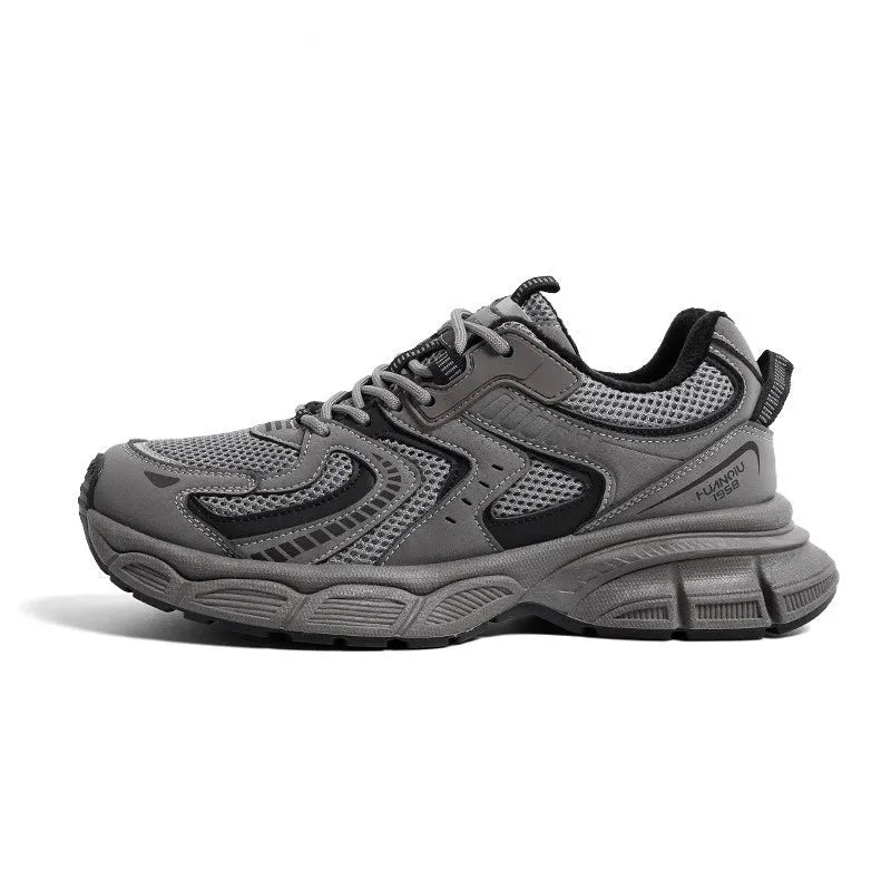 Grey low-top casual sneaker with PU mesh upper, round toe, lace-up front, and a flat EVA sole on a neutral background.