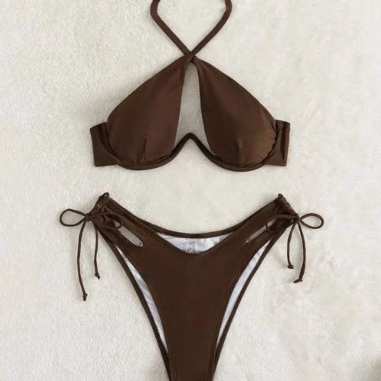Women's brown halter bikini top and briefs on a neutral background.