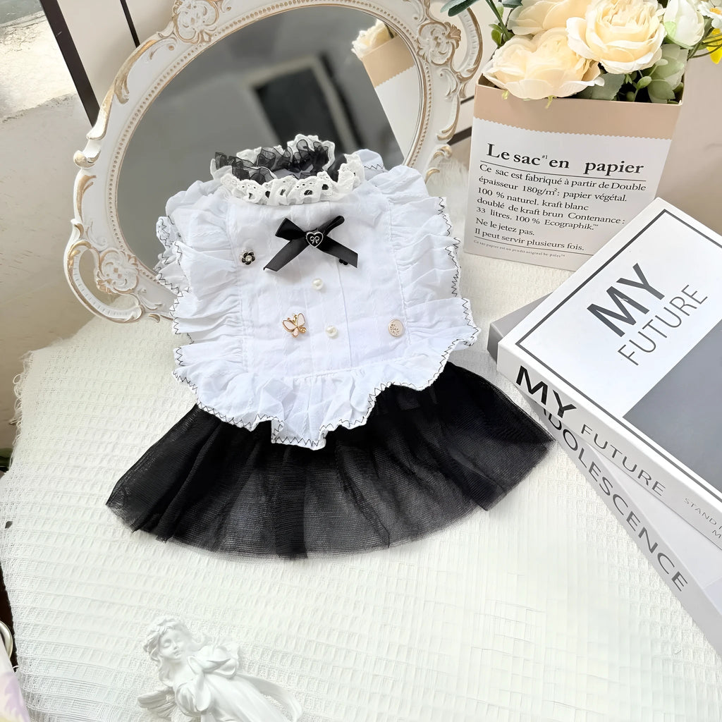White princess-style gauze skirt dog dress on a mannequin, showing the layered skirt design.