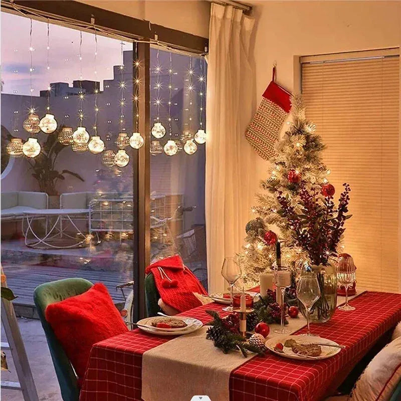 Set of 10 LED Christmas curtain lights with fairy and snowman wishing ball designs on a string.