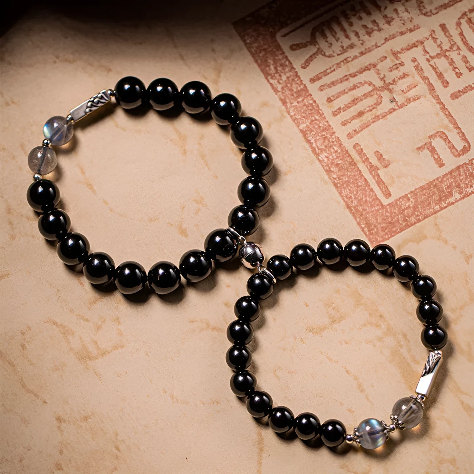 Obsidian Buddha beads couple bracelet DIY kit showing 8mm and 10mm beads for women's and men's bracelets
