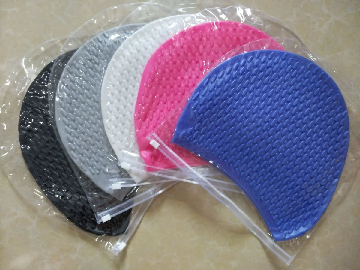Silicone swimming ear plugs for adults in solid black, blue, gray, pink, white, and yellow