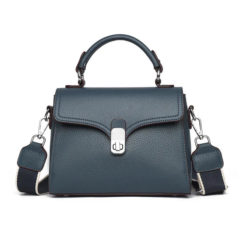 Korean commuter women's cross-body bag in genuine leather, oval shape, size 21x18x9cm, available in black