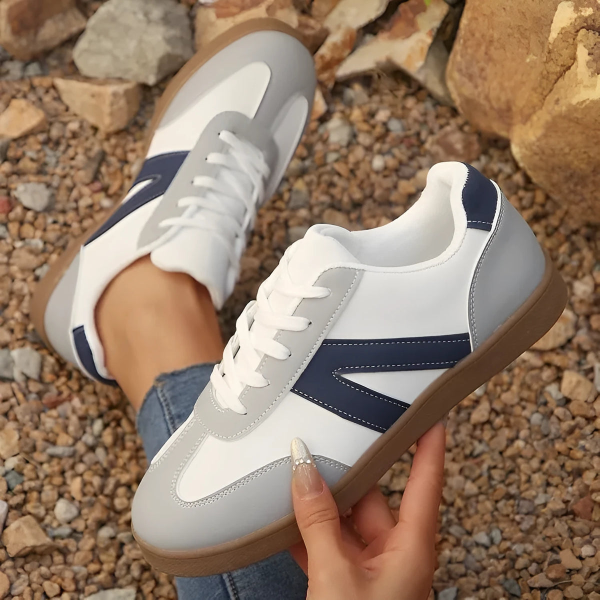 Blue women's low-top lace-up training shoes with artificial PU upper and rubber sole for hiking.