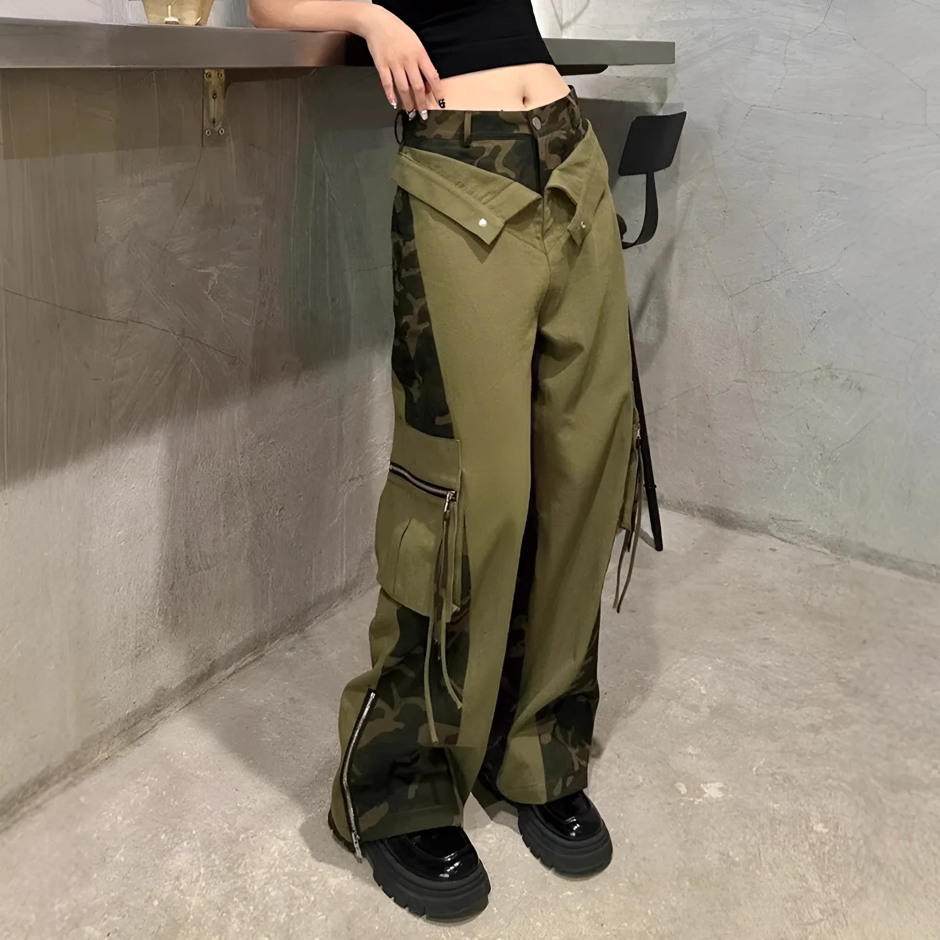 Retro high waist tooling jeans in dark khaki leopard print with contrast stitching and straight leg.