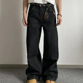 Man and woman modelling black retro wide-leg denim jeans with a straight loose fit.